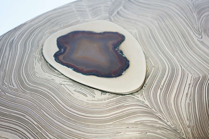 “Fernand Dresse designs brass etched cocktail tables features many times Agate stone.”