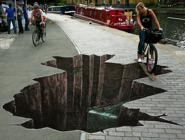 "Julian Beever is known all over the world for his pavement drawings, more especially his 3D illusions that are certainly making people walking on the streets happier."