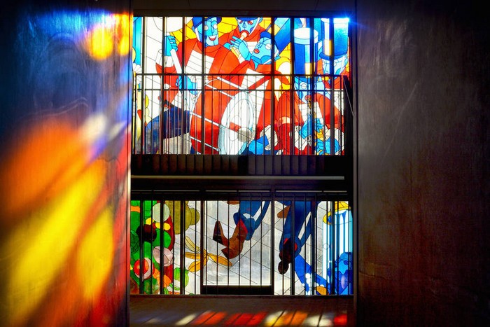 Stefan Glerum is the illustrator that created the visual concept of this amazing High Stained Glass Cathedral in Amsterdam.