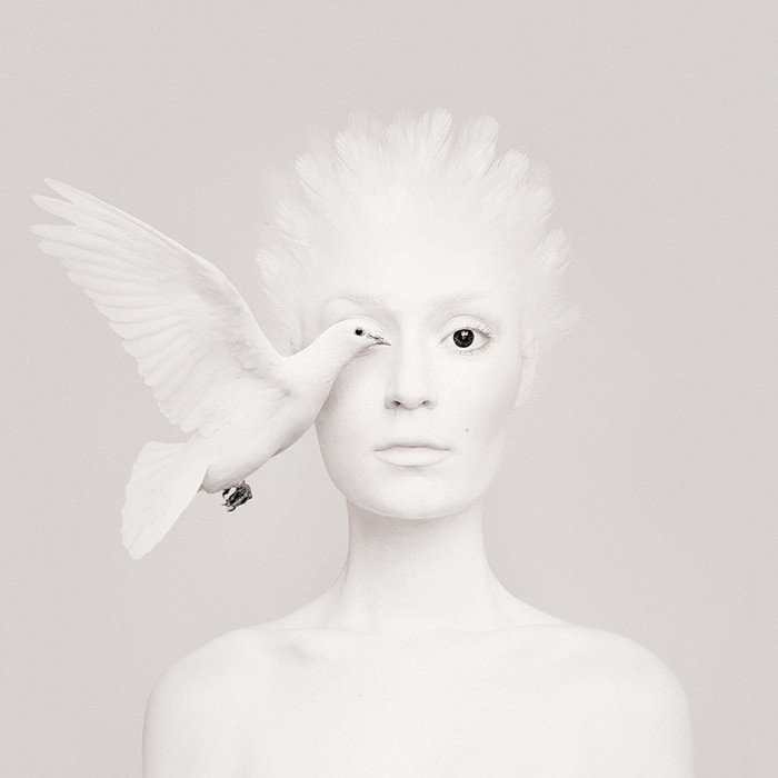 Flora Borsi is a young fine art photographer from Hungary forming a likeness between the animal kingdom and the human form.