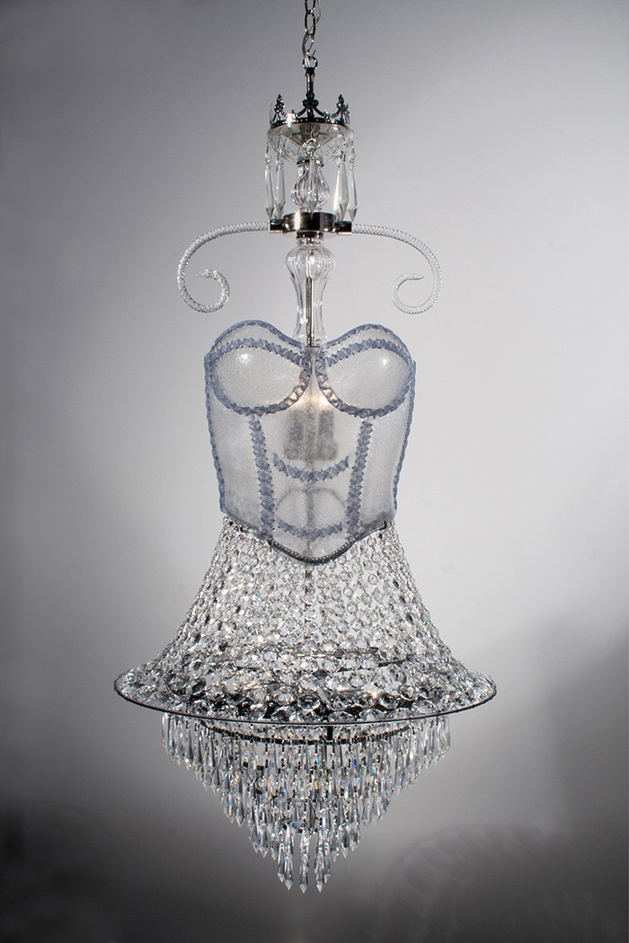 Susan Taylor Glasgow says her inspiration to create feminine objects comes from her mom. We admire her wearable chandeliers that are dress inspired.