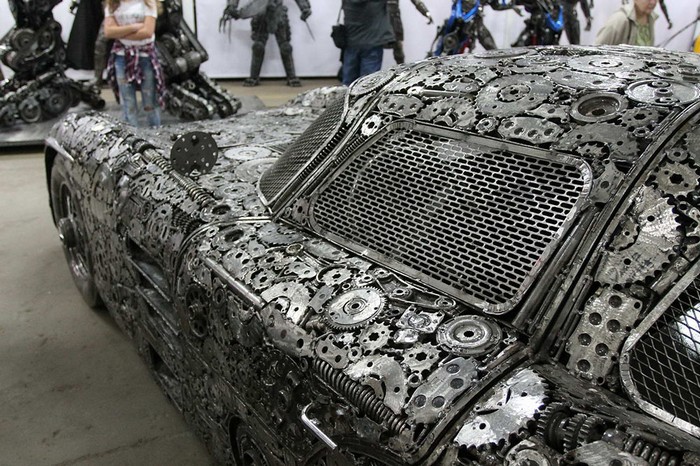 Fifty artists from across the globe have teamed up to create replicas of Recycled Metal luxury Cars.