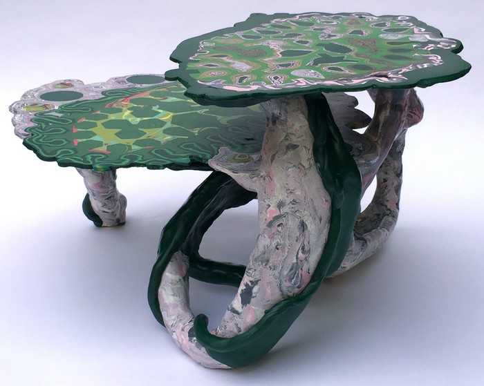 Daniel Wiener is a contemporary artist that creates colorful art of several types. Today we share the art furniture created by him, especially tables.